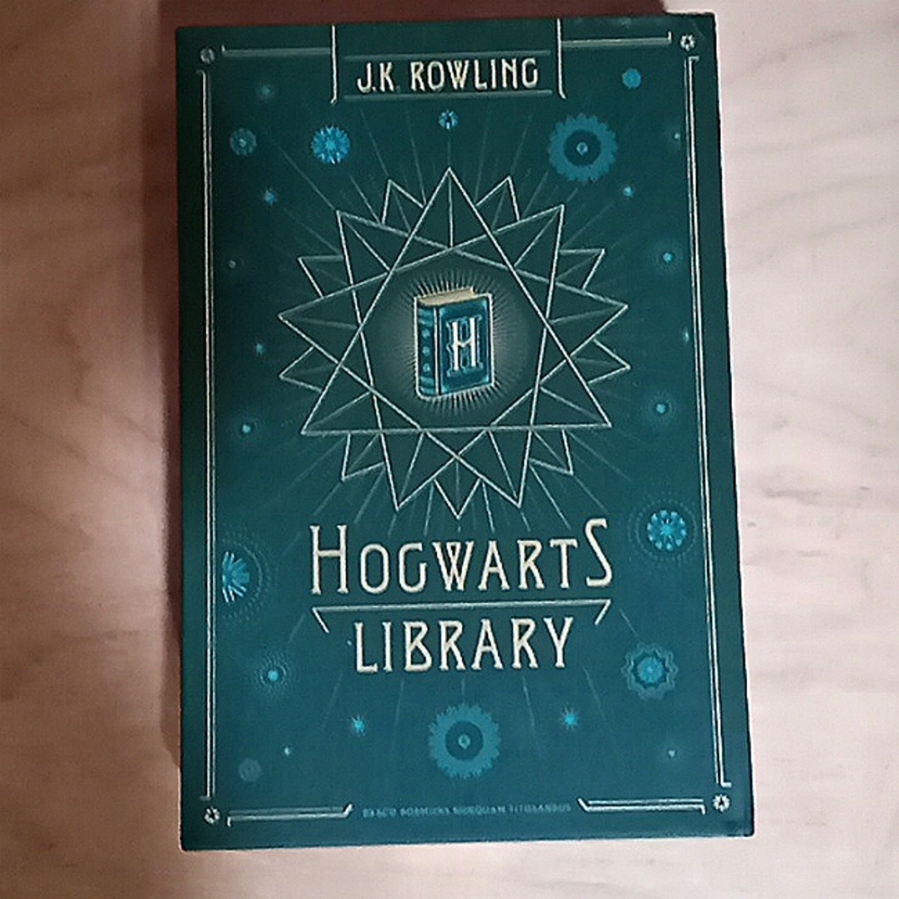 J.K. Rowling's Fantastic Beast's 3 Book Set NWOT